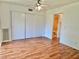 Spacious bedroom with sliding closets and stylish flooring for ample storage at 2100 World Parkway Blvd # 50, Clearwater, FL 33763