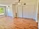 Spacious bedroom with sliding closets and stylish flooring for ample storage at 2100 World Parkway Blvd # 50, Clearwater, FL 33763