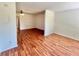 Open-concept living room featuring hardwood floors and a bright, inviting atmosphere at 2100 World Parkway Blvd # 50, Clearwater, FL 33763