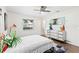 Spacious bedroom featuring light hardwood floors, a window, and minimalist decor at 2217 Brevard Ne Rd, St Petersburg, FL 33704