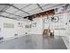 Spacious garage with laundry, stairs, bicycle and overhead storage at 2217 Brevard Ne Rd, St Petersburg, FL 33704