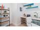 Home office area with stylish shelving, a modern desk, and a comfortable workspace at 2217 Brevard Ne Rd, St Petersburg, FL 33704