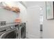 Convenient laundry room with modern washer and dryer at 2511 N Grady Ave # 52, Tampa, FL 33607