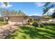 Charming single-story home with well-manicured lawn and brick driveway, with solar panels at 2648 Countryclub Dr, Clearwater, FL 33761