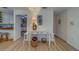 Inviting entryway with a stylish desk and convenient access to the kitchen at 2700 Bayshore Blvd # 1E, Dunedin, FL 34698