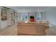 Spacious living room with bright natural light and large built-in shelving at 2700 Bayshore Blvd # 1E, Dunedin, FL 34698