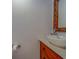 Chic powder room with stylish mirror, designer sink, and beadboard accents at 2700 Bayshore Blvd # 1E, Dunedin, FL 34698