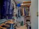 Organized walk-in closet featuring shelves, hanging rods, and storage for clothing and accessories at 2700 Bayshore Blvd # 1E, Dunedin, FL 34698