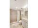 Neat bathroom offering a tiled shower, sleek vanity, and storage cabinets for a functional design at 400 Island Way # 1708, Clearwater Beach, FL 33767