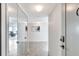 Inviting entryway featuring tiled floors, mirrored closet, and a view of the living area at 400 Island Way # 1708, Clearwater Beach, FL 33767