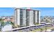 High-rise condo building with multiple balconies overlooking water views from Clearwater, Florida at 400 Island Way # 1708, Clearwater Beach, FL 33767