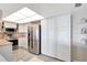 Well-lit kitchen with stainless steel appliances and light-colored cabinetry at 400 Island Way # 1708, Clearwater Beach, FL 33767