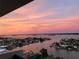 Colorful sunset view overlooking the waterfront neighborhood and bay at 400 Island Way # 1708, Clearwater Beach, FL 33767