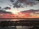 Spectacular sunset view overlooking the waterfront neighborhood and bay at 400 Island Way # 1708, Clearwater Beach, FL 33767