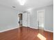 Bedroom featuring blue walls, a door to a bathroom, and an interior closet at 4500 23Rd S Ave, St Petersburg, FL 33711