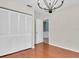Bedroom with hardwood floors, closet and open doorway at 4500 23Rd S Ave, St Petersburg, FL 33711
