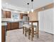 Bright eat-in kitchen featuring stainless steel appliances and modern pendant lighting at 4500 23Rd S Ave, St Petersburg, FL 33711