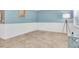Living room with blue walls and tiled floor at 4500 23Rd S Ave, St Petersburg, FL 33711