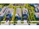 Aerial view of a home showcasing its backyard, landscaping, and proximity to neighboring properties at 5236 Wishing Arch Dr, Apollo Beach, FL 33572