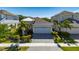 Charming single-Gathering home with a well-manicured lawn, beautiful landscaping, and a spacious driveway at 5236 Wishing Arch Dr, Apollo Beach, FL 33572