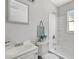 Clean bathroom featuring a shower-tub combination and stylish decor at 5340 4Th S Ave, St Petersburg, FL 33707