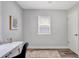 Clean and modern bedroom with stylish desk and light-filled window at 5340 4Th S Ave, St Petersburg, FL 33707