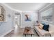 Living room featuring hardwood floors and an open space with lots of natural light at 5340 4Th S Ave, St Petersburg, FL 33707