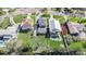 Aerial view of the home, showcasing its lush backyard and pool, and its location in a residential neighborhood at 5426 Venetian Ne Blvd, St Petersburg, FL 33703