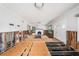 Bright living room featuring a fireplace, large windows and under-construction floors at 5426 Venetian Ne Blvd, St Petersburg, FL 33703