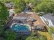 Aerial view of the home showcasing the private pool, landscaped backyard, and the layout of the property at 5507 Bluejay Ln, Tampa, FL 33625