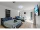 Spacious bedroom with tile flooring, two queen beds, and bright natural light at 5507 Bluejay Ln, Tampa, FL 33625