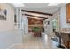 Spacious game room with a pool table, exposed beams, and natural light from skylights at 5507 Bluejay Ln, Tampa, FL 33625