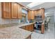 Beautiful kitchen with granite countertops, stainless steel appliances, and ample cabinet space at 5507 Bluejay Ln, Tampa, FL 33625