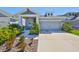 Charming single-story home with well-maintained landscaping, inviting curb appeal, and attached garage at 5523 Del Coronado Dr, Apollo Beach, FL 33572