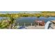 Backyard with waterfront access, dock and water slide at 6633 Driftwood Dr, Hudson, FL 34667
