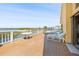Exterior deck with table, chairs and waterfront views at 6633 Driftwood Dr, Hudson, FL 34667