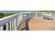 Exterior deck with table, chairs and waterfront views at 6633 Driftwood Dr, Hudson, FL 34667