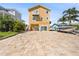 Inviting coastal home with spacious driveway and a boat for aquatic adventures at 6633 Driftwood Dr, Hudson, FL 34667