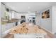 Modern kitchen features stainless steel appliances, granite countertops and large island at 6633 Driftwood Dr, Hudson, FL 34667