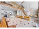 Open concept living area boasts a modern kitchen, dining area and soaring ceilings at 6633 Driftwood Dr, Hudson, FL 34667