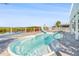 A luxurious pool with a slide provides endless entertainment and relaxation at 6633 Driftwood Dr, Hudson, FL 34667