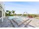 Exterior pool and spa with waterfront view at 6633 Driftwood Dr, Hudson, FL 34667