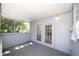 Covered patio with screens and french doors at 6712 W Clifton St, Tampa, FL 33634