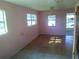 Bright living room with hardwood floors and natural light at 710 E 129Th Ave, Tampa, FL 33612
