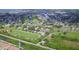 A beautiful aerial view of Apollo Beach featuring residential areas and community amenities, perfect for Gathering living at 819 Birdie Way, Apollo Beach, FL 33572