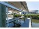 Boat lift with a canopy offers protection and easy access for boating enthusiasts at 819 Birdie Way, Apollo Beach, FL 33572