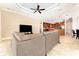 Bright living room showing an open floorplan, recessed lighting, and access to the kitchen at 819 Birdie Way, Apollo Beach, FL 33572