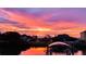 Scenic sunset view from the property, overlooking the water and surrounding landscape at 819 Birdie Way, Apollo Beach, FL 33572