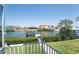 Picturesque waterfront view with neighboring houses with docks along the canal at 819 Birdie Way, Apollo Beach, FL 33572