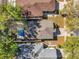 Aerial view of home's roof, backyard, and neighborhood at 8528 Quarter Horse Dr, Riverview, FL 33578